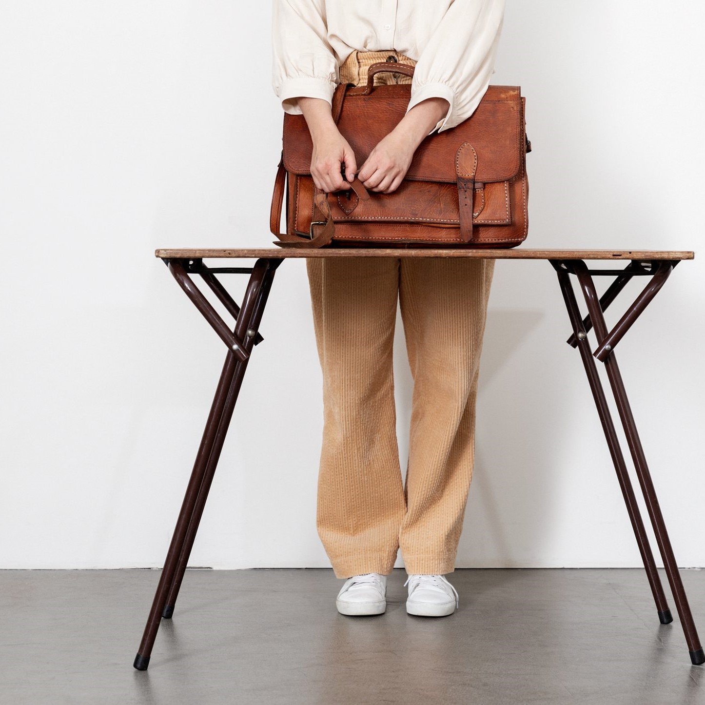 Table with a person and bag